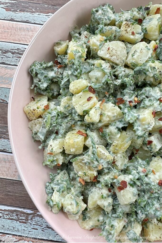 Chopped Kale Creamy Ranch Potato Salad - Say goodbye to boring traditional potato salad. This recipe gives the classic dish a vibrant and healthy twist with the addition of chopped kale. Forget everything you thought you knew about kale; when paired with creamy Yukon Gold Potatoes and a tangy homemade ranch dressing, it pretty much becomes a match made in heaven. Get ready for a potato salad recipe that will have everyone in your family coming back for seconds of this surprisingly tasty, green-packed side dish.