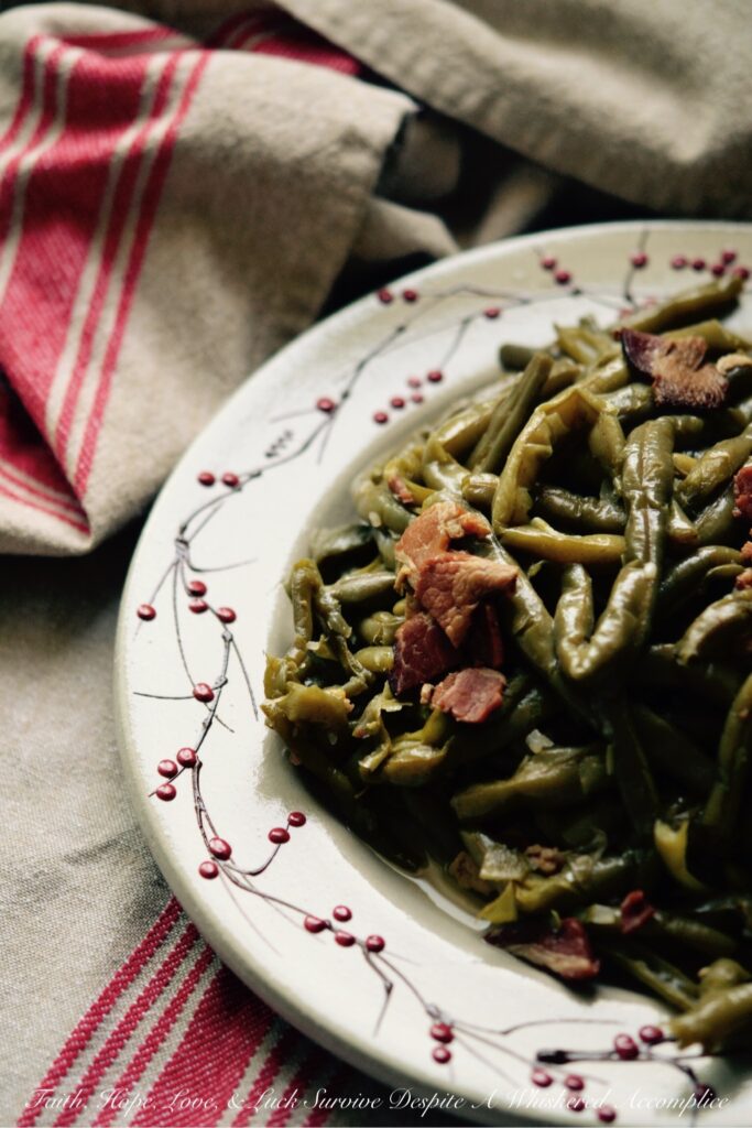 Crockpot Southern Green Beans with Bacon - Forget bland, boring, flavorless vegetable sides; these tender, melt-in-your-mouth green beans infused with smoky, salty bacon are perfect for any weeknight meal or holiday gathering. So, dust off your crockpot because you’re about to discover just how easy it is to create a crowd-pleasing bacony Southern veggie side dish that even the pickiest eaters will devour. Get ready to transform ordinary frozen green beans into an irresistible, bacon-loaded delight that your entire family will simply adore.