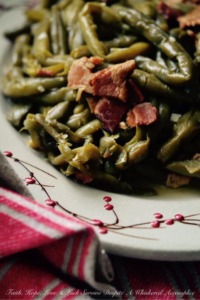 Crockpot Southern Green Beans with Bacon - Forget bland, boring, flavorless vegetable sides; these tender, melt-in-your-mouth green beans infused with smoky, salty bacon are perfect for any weeknight meal or holiday gathering. So, dust off your crockpot because you’re about to discover just how easy it is to create a crowd-pleasing bacony Southern veggie side dish that even the pickiest eaters will devour. Get ready to transform ordinary frozen green beans into an irresistible, bacon-loaded delight that your entire family will simply adore.