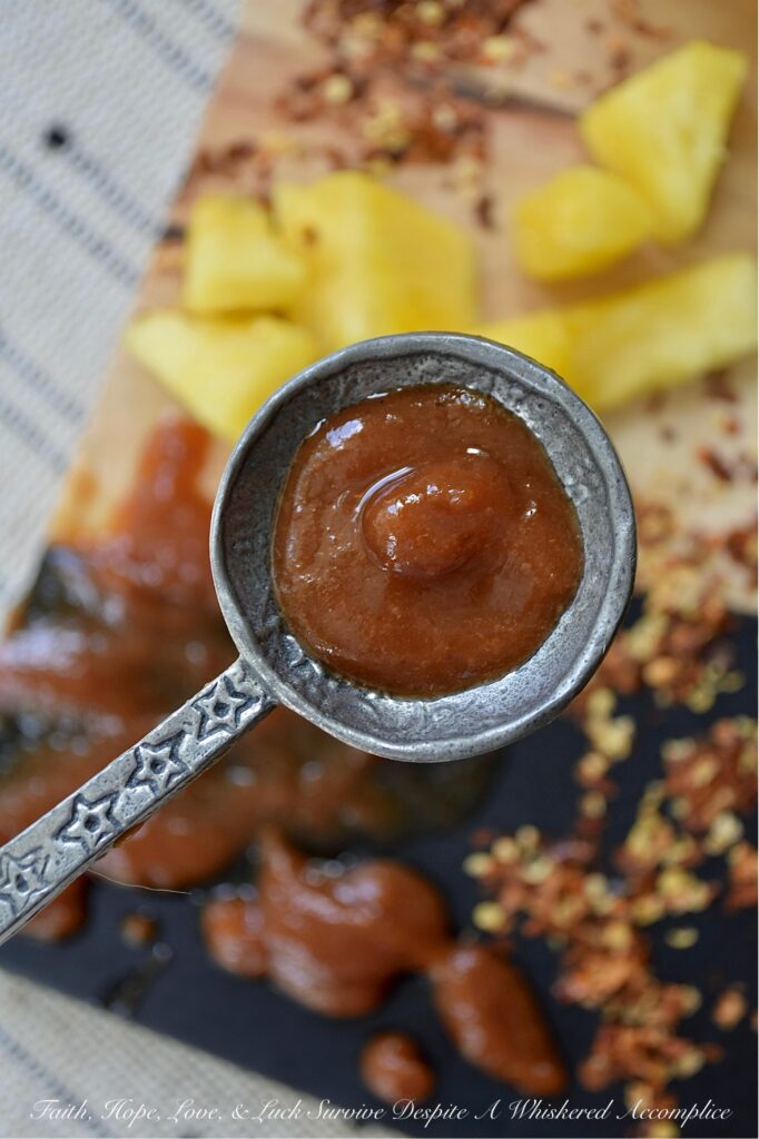 Sweet & Spicy Hawaiian Pineapple Ketchup - Tired of the same dull store-bought tomato ketchup? Prepare to transport your taste buds to a tropical island paradise with this sweet and spicy ketchup, infused with the tangy sweetness of fresh pineapple and the fiery kick of crushed red pepper flakes. A touch of savory soy sauce and subtle hints of onion, garlic, and ginger help make this Hawaiian-inspired condiment almost as versatile as it is delicious. Whether you use this ketchup to create your favorite party meatballs, as a spread with mayonnaise for ham or chicken sandwiches, as a glaze for grilled meats or seafood, or simply as a dip for grilled, roasted, or deep-fried vegetables, this sweet ketchup is sure to spice up your menu.