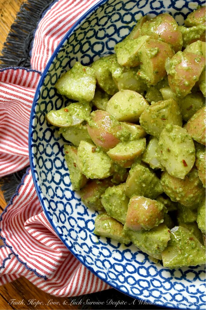 Lemony Swiss Chard Pesto Potato Salad - Traditional mayonnaise-based potato salads can sometimes feel a bit heavy, especially when the weather is scorching. This recipe is not only designed to withstand warmer weather, but it also boasts a delicious and unexpected twist. A bright, lemony Swiss chard pesto. With a touch of honey, a squeeze of fresh lemon juice, and a little kick from crushed red pepper flakes, this potato salad is the perfect side dish for just about any meal. Best of all, this is a small-batch recipe, ensuring you enjoy a fresh, satisfying side dish without the commitment of leftovers for days to come.