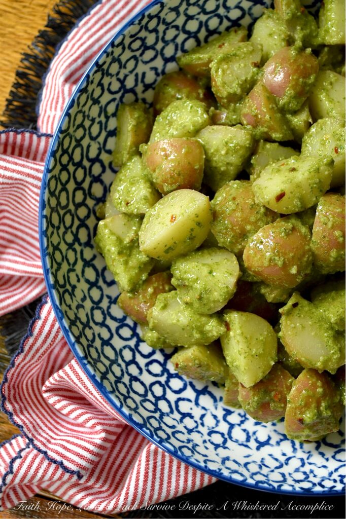 Lemony Swiss Chard Pesto Potato Salad - Traditional mayonnaise-based potato salads can sometimes feel a bit heavy, especially when the weather is scorching. This recipe is not only designed to withstand warmer weather, but it also boasts a delicious and unexpected twist. A bright, lemony Swiss chard pesto. With a touch of honey, a squeeze of fresh lemon juice, and a little kick from crushed red pepper flakes, this potato salad is the perfect side dish for just about any meal. Best of all, this is a small-batch recipe, ensuring you enjoy a fresh, satisfying side dish without the commitment of leftovers for days to come.