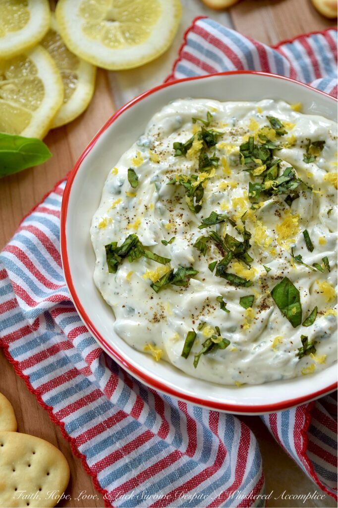 Whipped Feta with Lemon Zest & Fresh Basil - Whether you're hosting a sophisticated cocktail party, inviting friends over for a casual brunch, or simply seeking a delightful, creamy dip for a romantic movie night, this deceptively simple yet incredibly elegant dip is designed to impress with almost zero stress. When you combine the briny saltiness of feta cheese with the rich creaminess of cream cheese, you create something truly irresistible. Mixed to airy perfection and infused with bright lemon zest, fresh basil, and a hint of honey, this whipped feta not only looks stunning on any spread but pairs beautifully with everything from warm pita bread and crunchy pretzels to hearty focaccia and crisp baguette slices.