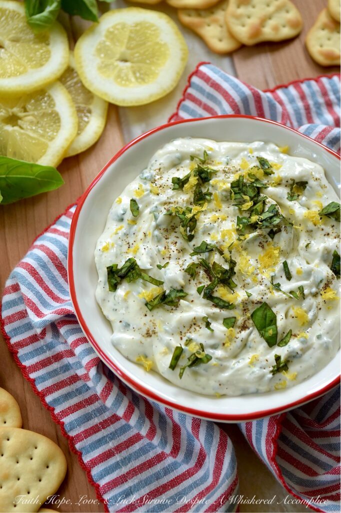 Whipped Feta with Lemon Zest & Fresh Basil - Whether you're hosting a sophisticated cocktail party, inviting friends over for a casual brunch, or simply seeking a delightful, creamy dip for a romantic movie night, this deceptively simple yet incredibly elegant dip is designed to impress with almost zero stress. When you combine the briny saltiness of feta cheese with the rich creaminess of cream cheese, you create something truly irresistible. Mixed to airy perfection and infused with bright lemon zest, fresh basil, and a hint of honey, this whipped feta not only looks stunning on any spread but pairs beautifully with everything from warm pita bread and crunchy pretzels to hearty focaccia and crisp baguette slices.