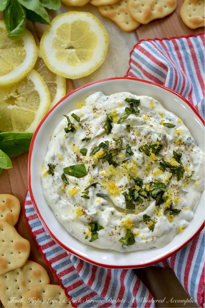 Whipped Feta with Lemon Zest & Fresh Basil - Whether you're hosting a sophisticated cocktail party, inviting friends over for a casual brunch, or simply seeking a delightful, creamy dip for a romantic movie night, this deceptively simple yet incredibly elegant dip is designed to impress with almost zero stress. When you combine the briny saltiness of feta cheese with the rich creaminess of cream cheese, you create something truly irresistible. Mixed to airy perfection and infused with bright lemon zest, fresh basil, and a hint of honey, this whipped feta not only looks stunning on any spread but pairs beautifully with everything from warm pita bread and crunchy pretzels to hearty focaccia and crisp baguette slices.