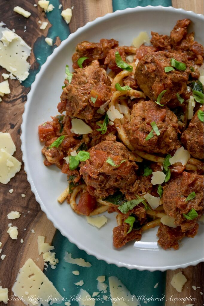Italian Turkey Meatballs with Tomato Sauce - Forget dry and bland meatballs. These ground turkey meatballs are bursting with flavor thanks to a blend of Italian seasoning, parmesan cheese, and a touch of grated sweet yellow onion. Skillet-browned to perfection and then gently simmered in your favorite store-bought or homemade chunky tomato sauce, these Italian meatballs are simple to prepare and utterly delicious. Whether you serve them with pasta or vegetables, use them to top a pizza, or pile them high on a meatball sub, their versatility and simplicity make them an absolute dream for busy evenings.