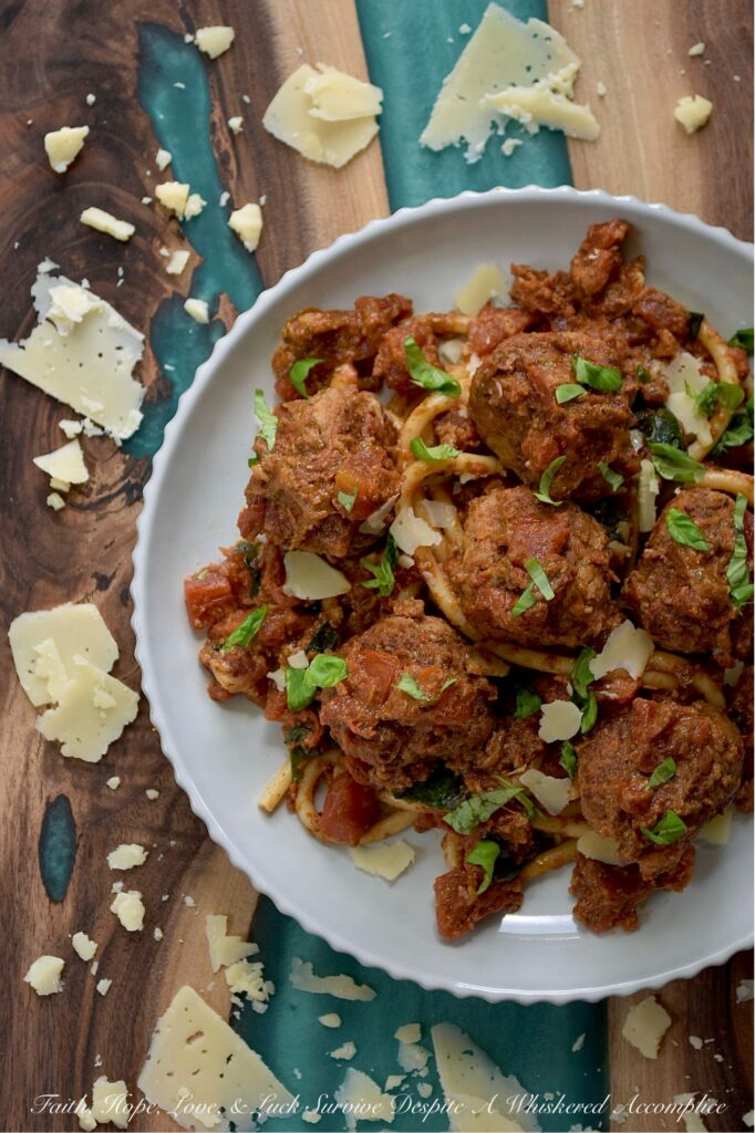 Italian Turkey Meatballs with Tomato Sauce - Forget dry and bland meatballs. These ground turkey meatballs are bursting with flavor thanks to a blend of Italian seasoning, parmesan cheese, and a touch of grated sweet yellow onion. Skillet-browned to perfection and then gently simmered in your favorite store-bought or homemade chunky tomato sauce, these Italian meatballs are simple to prepare and utterly delicious. Whether you serve them with pasta or vegetables, use them to top a pizza, or pile them high on a meatball sub, their versatility and simplicity make them an absolute dream for busy evenings.