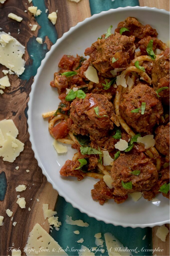 Italian Turkey Meatballs with Tomato Sauce - Forget dry and bland meatballs. These ground turkey meatballs are bursting with flavor thanks to a blend of Italian seasoning, parmesan cheese, and a touch of grated sweet yellow onion. Skillet-browned to perfection and then gently simmered in your favorite store-bought or homemade chunky tomato sauce, these Italian meatballs are simple to prepare and utterly delicious. Whether you serve them with pasta or vegetables, use them to top a pizza, or pile them high on a meatball sub, their versatility and simplicity make them an absolute dream for busy evenings.