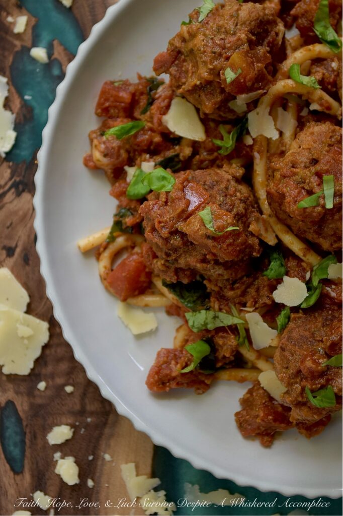 Italian Turkey Meatballs with Tomato Sauce - Forget dry and bland meatballs. These ground turkey meatballs are bursting with flavor thanks to a blend of Italian seasoning, parmesan cheese, and a touch of grated sweet yellow onion. Skillet-browned to perfection and then gently simmered in your favorite store-bought or homemade chunky tomato sauce, these Italian meatballs are simple to prepare and utterly delicious. Whether you serve them with pasta or vegetables, use them to top a pizza, or pile them high on a meatball sub, their versatility and simplicity make them an absolute dream for busy evenings.