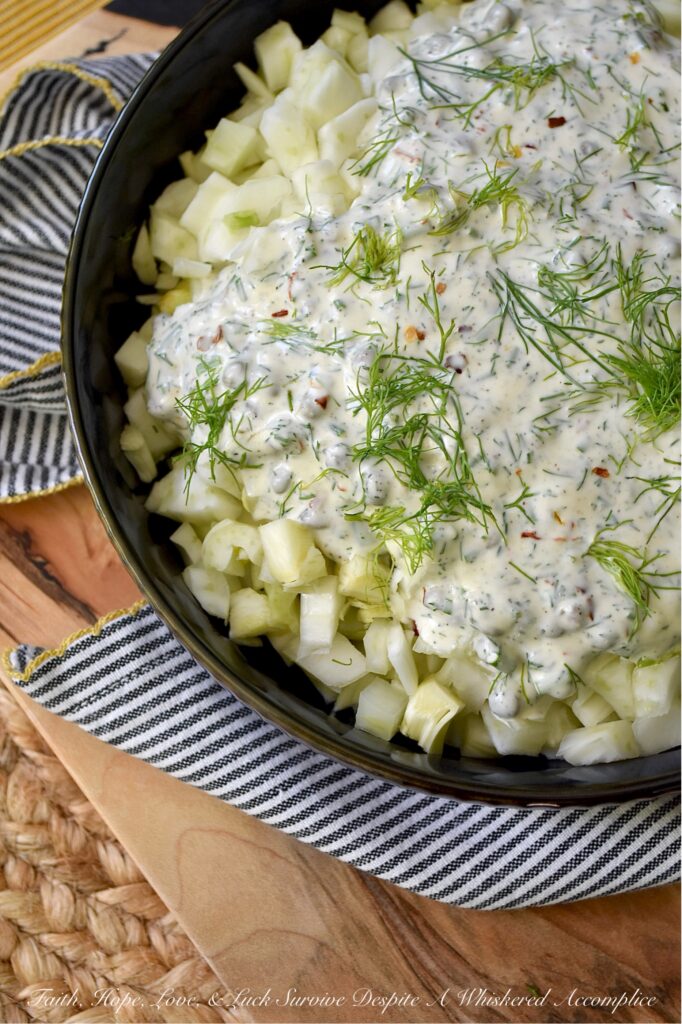 Creamy Fresh Herb Fennel Salad with Capers - Tired of the same boring coleslaw? While there’s nothing wrong with a classic, sometimes you simply crave a vibrant, fresh, and unexpectedly delicious alternative that still delivers a similar satisfying crunch and creamy texture. In this crunchy fennel side dish, crisp, subtly anise-flavored fennel is the star of the show. A rich, flavorful, creamy dressing and a mixture of aromatic fresh herbs pair perfectly with this chopped fennel salad, while capers add an irresistible pop of briny saltiness.