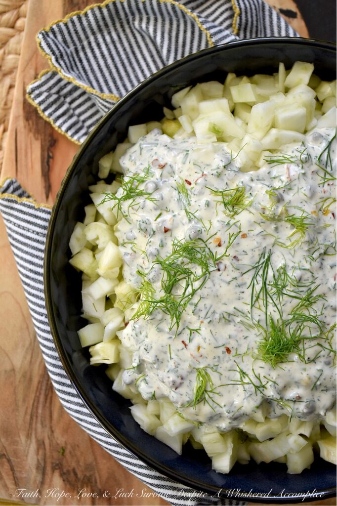 Creamy Fresh Herb Fennel Salad with Capers - Tired of the same boring coleslaw? While there’s nothing wrong with a classic, sometimes you simply crave a vibrant, fresh, and unexpectedly delicious alternative that still delivers a similar satisfying crunch and creamy texture. In this crunchy fennel side dish, crisp, subtly anise-flavored fennel is the star of the show. A rich, flavorful, creamy dressing and a mixture of aromatic fresh herbs pair perfectly with this chopped fennel salad, while capers add an irresistible pop of briny saltiness.