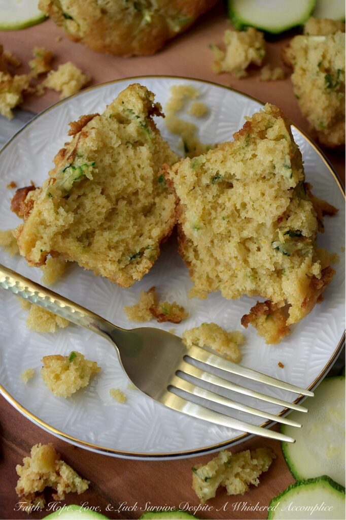 Zucchini Cornbread Muffins (Small-Batch Recipe) - When zucchini is in peak season, it's the perfect opportunity to whip up a batch of these zucchini cornbread muffins. These muffins are delicately sweet, wonderfully moist, and have just the right amount of crumbly texture. They are versatile enough to accompany any meal. Whether you're planning a lazy breakfast, a summer brunch gathering, or looking for the ideal side for a hearty bowl of homemade chili, these muffins are sure to be a hit. Don't be surprised if this small-batch recipe disappears in minutes; you might even want to consider baking a double batch.