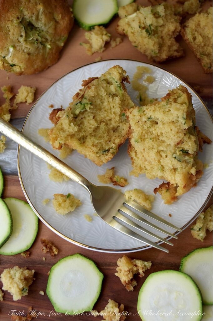 Zucchini Cornbread Muffins (Small-Batch Recipe) - When zucchini is in peak season, it's the perfect opportunity to whip up a batch of these zucchini cornbread muffins. These muffins are delicately sweet, wonderfully moist, and have just the right amount of crumbly texture. They are versatile enough to accompany any meal. Whether you're planning a lazy breakfast, a summer brunch gathering, or looking for the ideal side for a hearty bowl of homemade chili, these muffins are sure to be a hit. Don't be surprised if this small-batch recipe disappears in minutes; you might even want to consider baking a double batch.