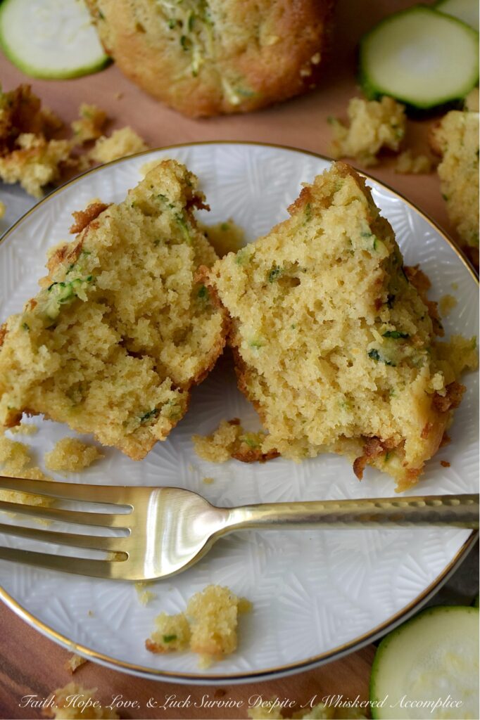 Zucchini Cornbread Muffins (Small-Batch Recipe) - When zucchini is in peak season, it's the perfect opportunity to whip up a batch of these zucchini cornbread muffins. These muffins are delicately sweet, wonderfully moist, and have just the right amount of crumbly texture. They are versatile enough to accompany any meal. Whether you're planning a lazy breakfast, a summer brunch gathering, or looking for the ideal side for a hearty bowl of homemade chili, these muffins are sure to be a hit. Don't be surprised if this small-batch recipe disappears in minutes; you might even want to consider baking a double batch.