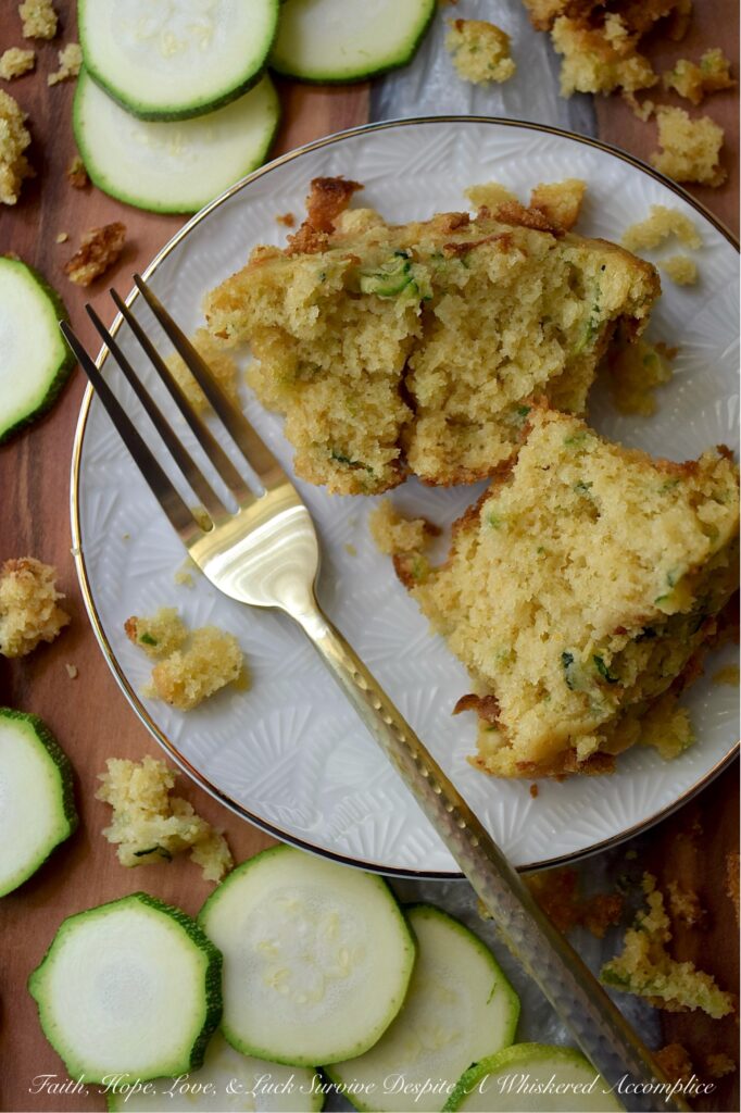 Zucchini Cornbread Muffins (Small-Batch Recipe) - When zucchini is in peak season, it's the perfect opportunity to whip up a batch of these zucchini cornbread muffins. These muffins are delicately sweet, wonderfully moist, and have just the right amount of crumbly texture. They are versatile enough to accompany any meal. Whether you're planning a lazy breakfast, a summer brunch gathering, or looking for the ideal side for a hearty bowl of homemade chili, these muffins are sure to be a hit. Don't be surprised if this small-batch recipe disappears in minutes; you might even want to consider baking a double batch.