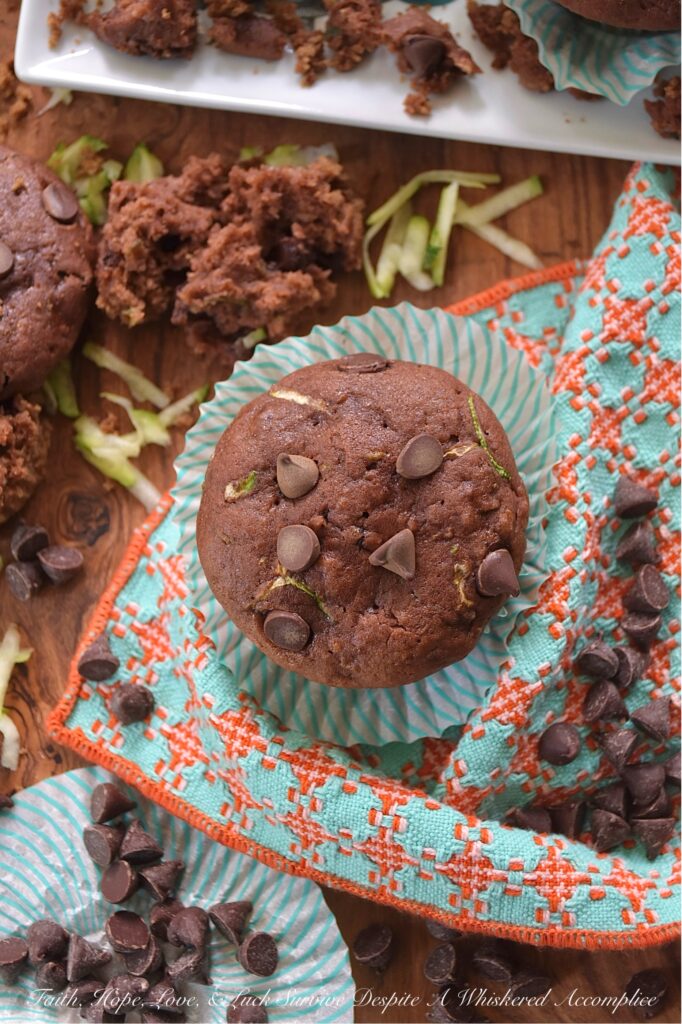 Chocolate Pudding Zucchini Bread Muffins - Wondering what to do with that seemingly endless supply of fresh summer zucchini? Rather than letting a single one go to waste, turn your surplus zucchini into something truly spectacular. These super-moist, chocolaty zucchini bread muffins are incredibly tender, packed with rich chocolate flavor, and surprisingly simple to whip up. The secret to their incredible moisture and taste lies in a box of chocolate instant pudding and pie filling, combined with fresh grated zucchini, eggs, oil, and a few everyday baking ingredients. Get ready to transform your summer harvest into sweet, decadent, chocolate chip-studded muffins that are so good, no one will even care that they're made with zucchini.