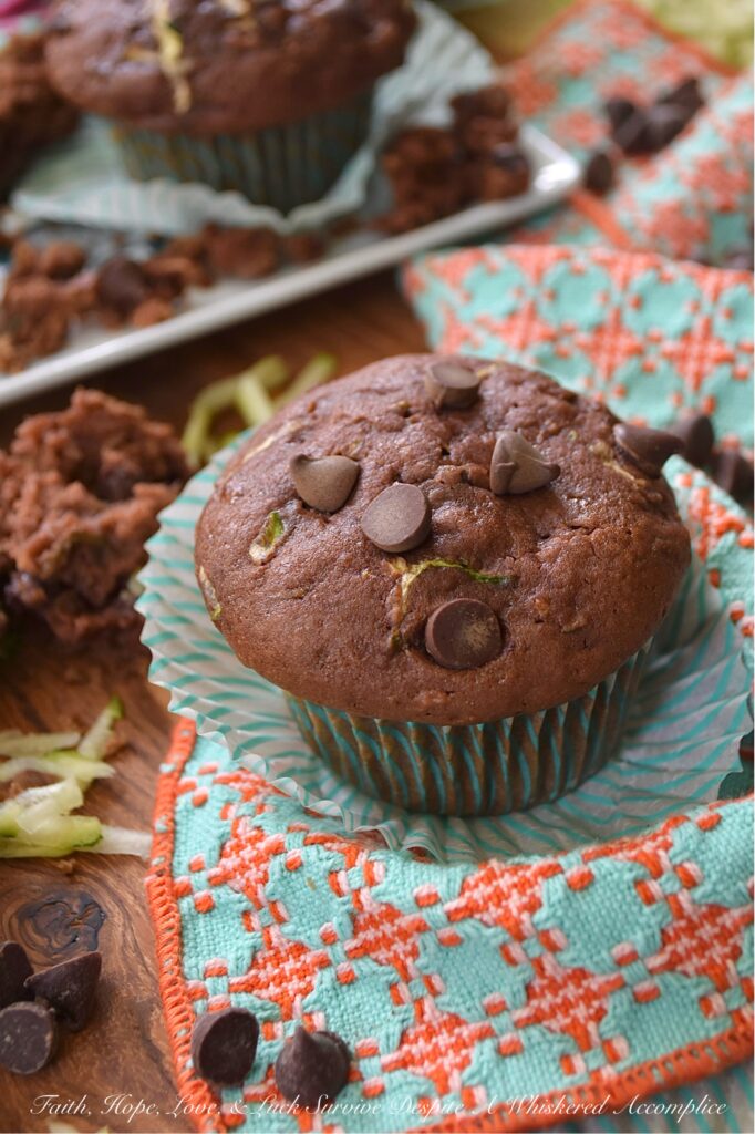 Chocolate Pudding Zucchini Bread Muffins - Wondering what to do with that seemingly endless supply of fresh summer zucchini? Rather than letting a single one go to waste, turn your surplus zucchini into something truly spectacular. These super-moist, chocolaty zucchini bread muffins are incredibly tender, packed with rich chocolate flavor, and surprisingly simple to whip up. The secret to their incredible moisture and taste lies in a box of chocolate instant pudding and pie filling, combined with fresh grated zucchini, eggs, oil, and a few everyday baking ingredients. Get ready to transform your summer harvest into sweet, decadent, chocolate chip-studded muffins that are so good, no one will even care that they're made with zucchini.