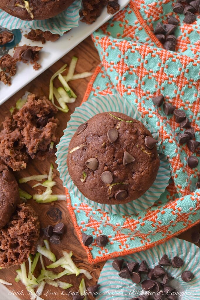 Chocolate Pudding Zucchini Bread Muffins - Wondering what to do with that seemingly endless supply of fresh summer zucchini? Rather than letting a single one go to waste, turn your surplus zucchini into something truly spectacular. These super-moist, chocolaty zucchini bread muffins are incredibly tender, packed with rich chocolate flavor, and surprisingly simple to whip up. The secret to their incredible moisture and taste lies in a box of chocolate instant pudding and pie filling, combined with fresh grated zucchini, eggs, oil, and a few everyday baking ingredients. Get ready to transform your summer harvest into sweet, decadent, chocolate chip-studded muffins that are so good, no one will even care that they're made with zucchini.