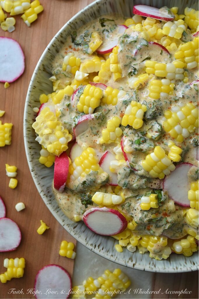 Fresh Basil Honey Mustard Radish & Corn Salad - When you combine fresh basil and honey mustard with sweet, juicy corn cut straight from the cob and crisp, thinly sliced radishes that have a nice peppery kick, you end up with a radish and corn salad that’s absolutely bursting with sweet and savory flavor. This summer side dish strikes a perfect balance of sweetness and tang, all while featuring the bright, refreshing taste of summer basil. With its herby creaminess and delightful crunch, this salad is sure to become a go-to favorite for almost any summer meal.