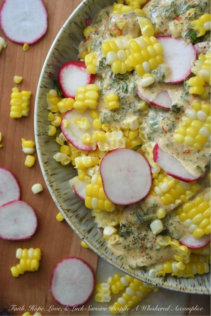 Fresh Basil Honey Mustard Radish & Corn Salad - When you combine fresh basil and honey mustard with sweet, juicy corn cut straight from the cob and crisp, thinly sliced radishes that have a nice peppery kick, you end up with a radish and corn salad that’s absolutely bursting with sweet and savory flavor. This summer side dish strikes a perfect balance of sweetness and tang, all while featuring the bright, refreshing taste of summer basil. With its herby creaminess and delightful crunch, this salad is sure to become a go-to favorite for almost any summer meal.