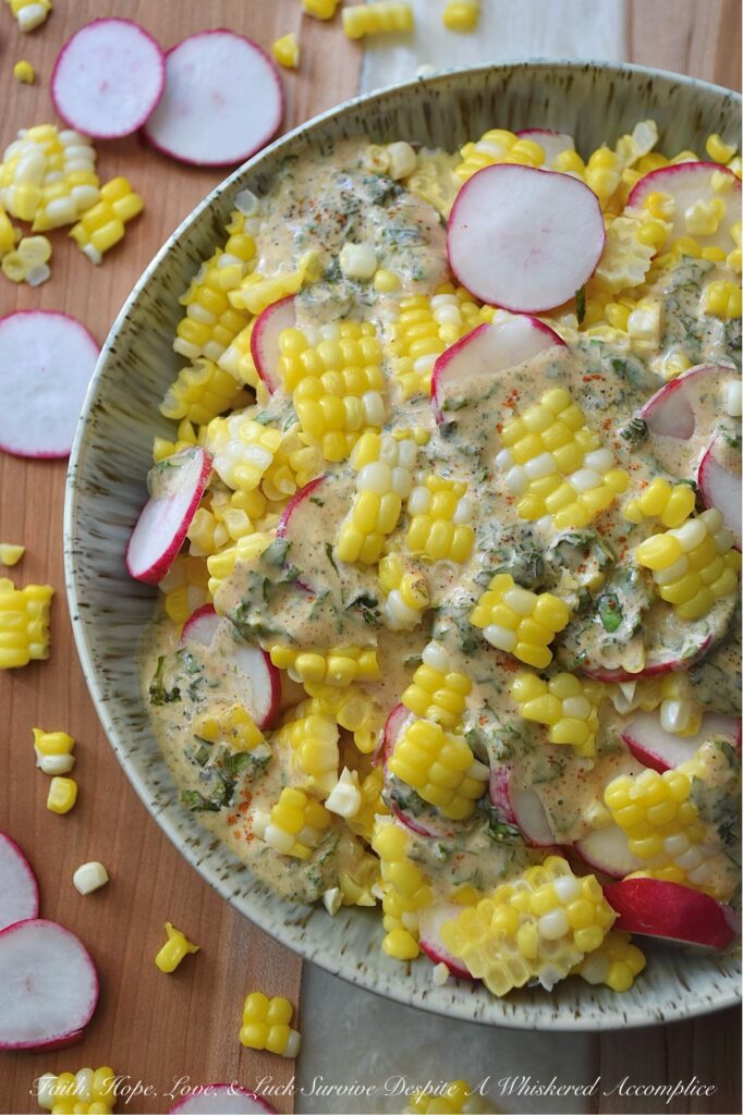 Fresh Basil Honey Mustard Radish & Corn Salad - When you combine fresh basil and honey mustard with sweet, juicy corn cut straight from the cob and crisp, thinly sliced radishes that have a nice peppery kick, you end up with a radish and corn salad that’s absolutely bursting with sweet and savory flavor. This summer side dish strikes a perfect balance of sweetness and tang, all while featuring the bright, refreshing taste of summer basil. With its herby creaminess and delightful crunch, this salad is sure to become a go-to favorite for almost any summer meal.
