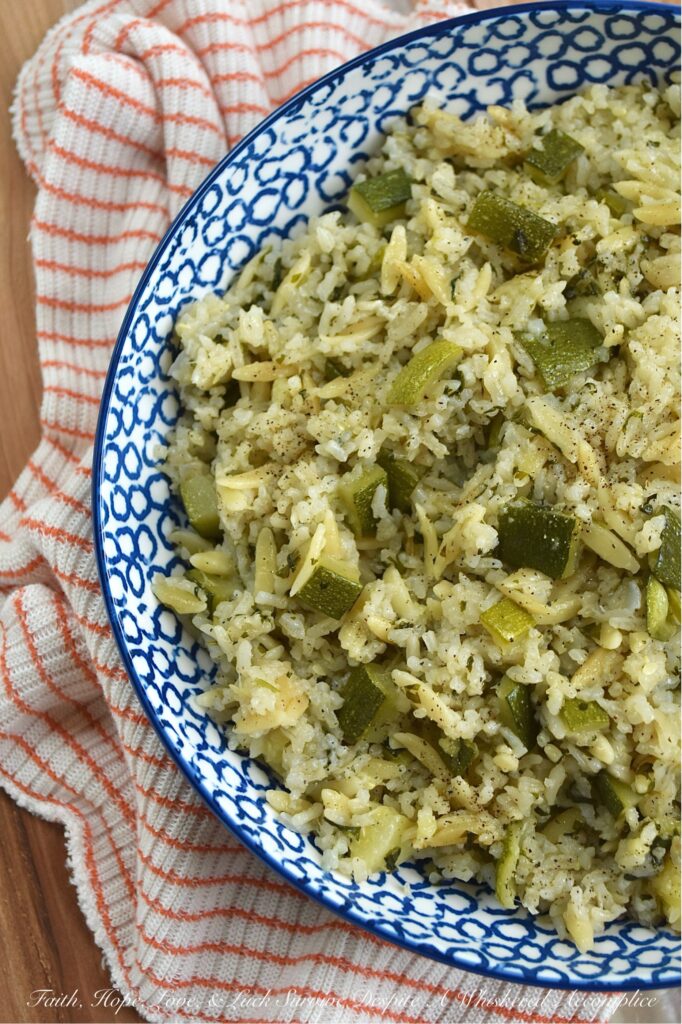 One-Pot Zucchini, Onion, & Cilantro Rice Pilaf - This one-pot rice and pasta pilaf perfectly marries fluffy jasmine rice with tender orzo pasta, creating a soft, buttery side dish that's truly a delight. With fresh cilantro, diced zucchini, and sweet sautéed yellow onion, it’s the ideal companion for everything from a simple weeknight meal to your favorite Mexican feasts. Best of all, it's a brilliant way to use up fresh summer zucchini and a guaranteed crowd-pleaser for even the toughest critics. And, if you have friends at your table who aren’t fans of cilantro, no worries. You can easily swap it out for some fresh parsley instead.