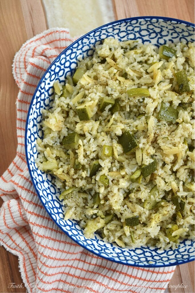 One-Pot Zucchini, Onion, & Cilantro Rice Pilaf - This one-pot rice and pasta pilaf perfectly marries fluffy jasmine rice with tender orzo pasta, creating a soft, buttery side dish that's truly a delight. With fresh cilantro, diced zucchini, and sweet sautéed yellow onion, it’s the ideal companion for everything from a simple weeknight meal to your favorite Mexican feasts. Best of all, it's a brilliant way to use up fresh summer zucchini and a guaranteed crowd-pleaser for even the toughest critics. And, if you have friends at your table who aren’t fans of cilantro, no worries. You can easily swap it out for some fresh parsley instead.