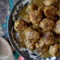 Saucy Green Chile & Beer Turkey Skillet Meatballs - Get ready to spice up your dinner routine with our Saucy Green Chile & Beer Skillet Meatballs. Tender ground turkey is gently mixed with a combination of flavorful taco seasoning, grated sweet yellow onion, a touch of cheddar cheese, and a generous helping of either fresh cilantro or fresh parsley. An egg and panko bread crumbs are also added to help bring everything together. After being browned to perfection, these savory turkey meatballs are then simmered in a unique and utterly delicious sauce combining beer and zesty green chile enchilada sauce. Served over rice, pasta, or mashed potatoes, these comforting, saucy stove-top skillet meatballs promise a family-friendly meal that is as easy to prepare as it is to enjoy.