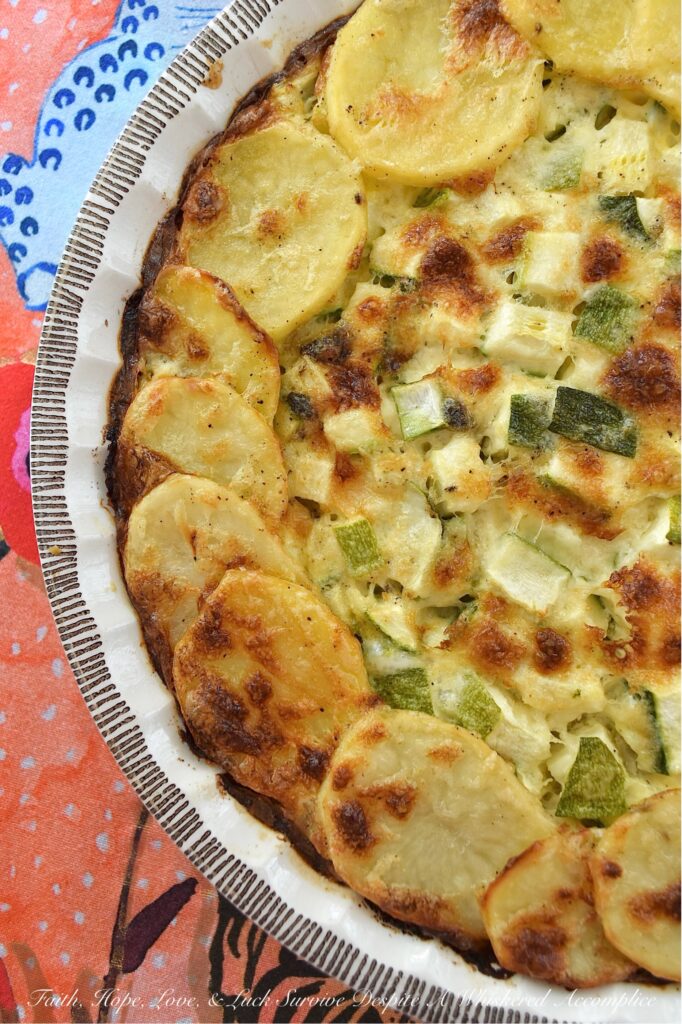 Parmesan Potato & Zucchini Crustless Quiche - If you happen to find yourself craving homemade quiche but don't have the time or desire to fuss with a homemade or store-bought pie crust, this crustless quiche recipe is for you. This easy-to-bake quiche, featuring a combination of freshly grated Parmesan cheese, thinly sliced potatoes, and tender diced zucchini, delivers on both flavor and texture. And, unlike most quiches, which contain vegetables that have turned to absolute mush, this one features vegetables that still retain some of their fantastic firm tenderness. Whether you're planning a meatless breakfast, a leisurely brunch, or a quick, healthy dinner, this simple yet delicious quiche is your new go-to recipe.