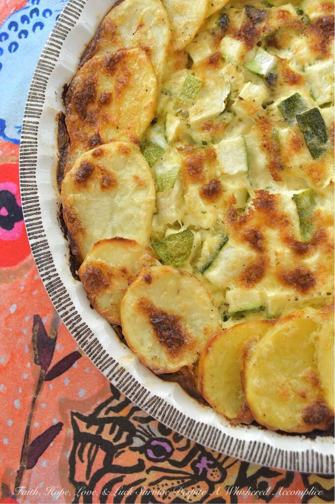 Parmesan Potato & Zucchini Crustless Quiche - If you happen to find yourself craving homemade quiche but don't have the time or desire to fuss with a homemade or store-bought pie crust, this crustless quiche recipe is for you. This easy-to-bake quiche, featuring a combination of freshly grated Parmesan cheese, thinly sliced potatoes, and tender diced zucchini, delivers on both flavor and texture. And, unlike most quiches, which contain vegetables that have turned to absolute mush, this one features vegetables that still retain some of their fantastic firm tenderness. Whether you're planning a meatless breakfast, a leisurely brunch, or a quick, healthy dinner, this simple yet delicious quiche is your new go-to recipe.