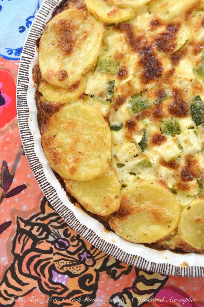 Parmesan Potato & Zucchini Crustless Quiche - If you happen to find yourself craving homemade quiche but don't have the time or desire to fuss with a homemade or store-bought pie crust, this crustless quiche recipe is for you. This easy-to-bake quiche, featuring a combination of freshly grated Parmesan cheese, thinly sliced potatoes, and tender diced zucchini, delivers on both flavor and texture. And, unlike most quiches, which contain vegetables that have turned to absolute mush, this one features vegetables that still retain some of their fantastic firm tenderness. Whether you're planning a meatless breakfast, a leisurely brunch, or a quick, healthy dinner, this simple yet delicious quiche is your new go-to recipe.