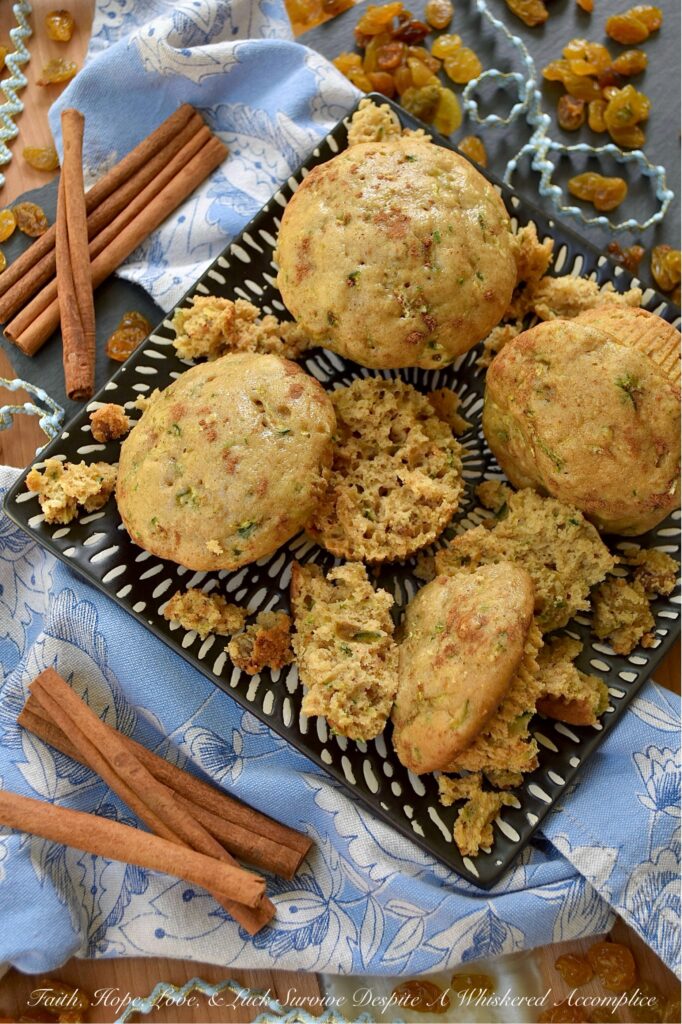 Cinnamon Raisin Vanilla Zucchini Bread Muffins - Got zucchini? Get ready for the best breakfast treat ever. These zucchini bread muffins aren't just good, they're incredibly soft and moist, thanks to the perfect combination of fresh grated zucchini and a box of vanilla instant pudding mix. Every soft, tender bite is full of warm, comforting ground cinnamon and sweet golden raisins, making these muffins the perfect way to start your morning. Seriously, if you have zucchini and love raisins, this is the muffin recipe you need to try.
