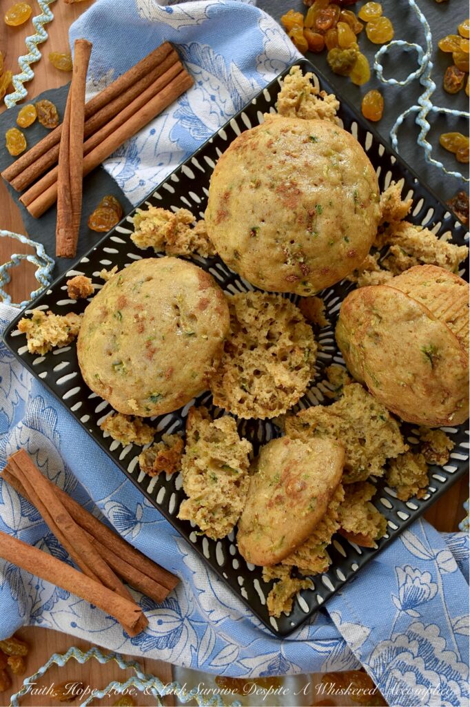 Cinnamon Raisin Vanilla Zucchini Bread Muffins - Got zucchini? Get ready for the best breakfast treat ever. These zucchini bread muffins aren't just good, they're incredibly soft and moist, thanks to the perfect combination of fresh grated zucchini and a box of vanilla instant pudding mix. Every soft, tender bite is full of warm, comforting ground cinnamon and sweet golden raisins, making these muffins the perfect way to start your morning. Seriously, if you have zucchini and love raisins, this is the muffin recipe you need to try.
