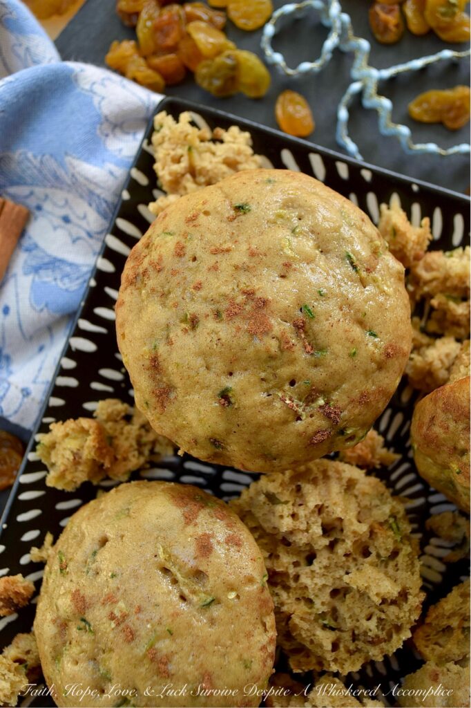 Cinnamon Raisin Vanilla Zucchini Bread Muffins - Got zucchini? Get ready for the best breakfast treat ever. These zucchini bread muffins aren't just good, they're incredibly soft and moist, thanks to the perfect combination of fresh grated zucchini and a box of vanilla instant pudding mix. Every soft, tender bite is full of warm, comforting ground cinnamon and sweet golden raisins, making these muffins the perfect way to start your morning. Seriously, if you have zucchini and love raisins, this is the muffin recipe you need to try.