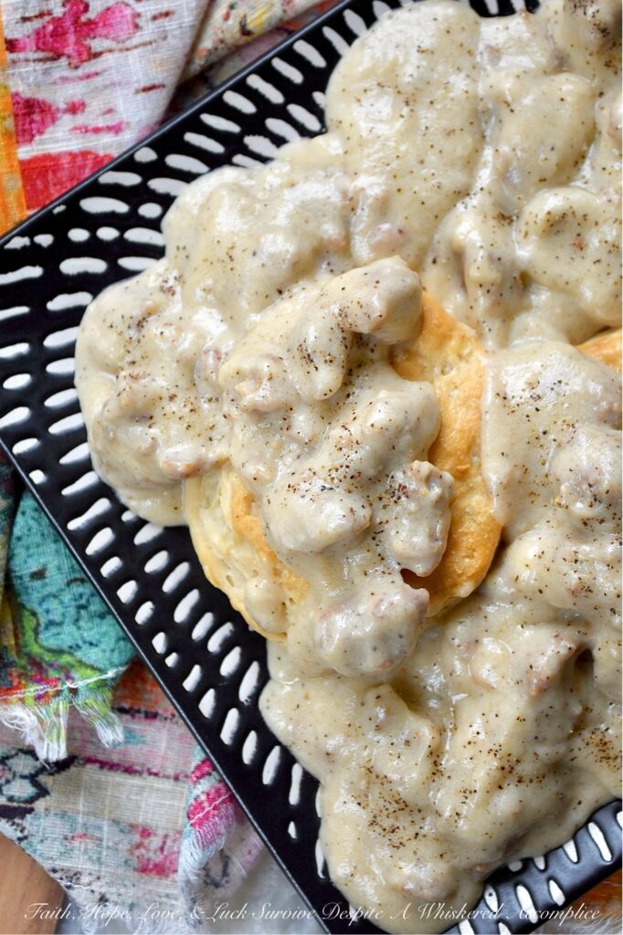 Weeknight Sweet Italian Sausage Gravy with Beer - Let's face it, some nights, making a complicated dinner just feels like too much. You're tired, hungry, and honestly, breakfast for dinner sounds much better and more comforting than heating up a frozen pizza. On those nights, this Weeknight Sweet Italian Sausage Gravy with Beer makes things a little easier and a whole lot tastier. This easy skillet recipe brings together sweet Italian sausage, beer, whole milk, and heavy cream to make a gravy that is rich, creamy, and a little sweet, simply seasoned with salt, pepper, and the flavor from the browned sausage. With this easy-to-make, delicious one-pan recipe, sausage gravy isn't just for breakfast anymore.