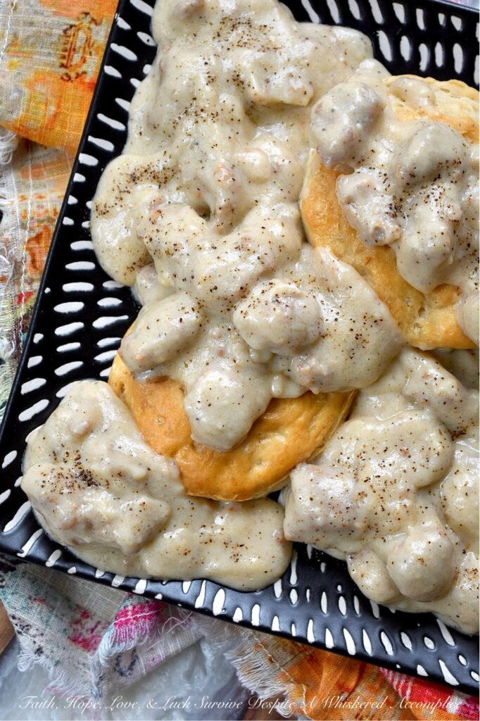 Weeknight Sweet Italian Sausage Gravy with Beer - Let's face it, some nights, making a complicated dinner just feels like too much. You're tired, hungry, and honestly, breakfast for dinner sounds much better and more comforting than heating up a frozen pizza. On those nights, this Weeknight Sweet Italian Sausage Gravy with Beer makes things a little easier and a whole lot tastier. This easy skillet recipe brings together sweet Italian sausage, beer, whole milk, and heavy cream to make a gravy that is rich, creamy, and a little sweet, simply seasoned with salt, pepper, and the flavor from the browned sausage. With this easy-to-make, delicious one-pan recipe, sausage gravy isn't just for breakfast anymore.