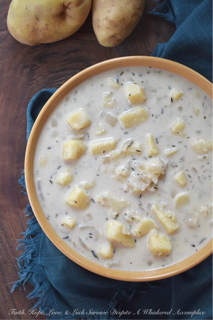 Budget-Friendly Chunky Potato Soup with Thyme - We all love the convenience of a store-bought rotisserie chicken for a quick weeknight dinner, but what if I told you that the best part of the rotisserie chicken is the part that you’ve been throwing away? The next time you buy a rotisserie chicken, instead of tossing out the leftover bones, place them in a large pot, cover them with cold water, and allow them to simmer for about an hour on your stovetop. You'll end up with a homemade broth that's richer and more flavorful than anything you can pour from a carton. And, by using this simple, homemade chicken broth to make this chunky potato soup with thyme, you'll see that you don't need to spend a lot to make amazing food with just a few basic ingredients.
