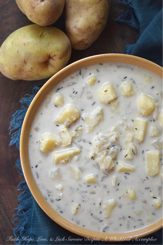 Budget-Friendly Chunky Potato Soup with Thyme - We all love the convenience of a store-bought rotisserie chicken for a quick weeknight dinner, but what if I told you that the best part of the rotisserie chicken is the part that you’ve been throwing away? The next time you buy a rotisserie chicken, instead of tossing out the leftover bones, place them in a large pot, cover them with cold water, and allow them to simmer for about an hour on your stovetop. You'll end up with a homemade broth that's richer and more flavorful than anything you can pour from a carton. And, by using this simple, homemade chicken broth to make this chunky potato soup with thyme, you'll see that you don't need to spend a lot to make amazing food with just a few basic ingredients.