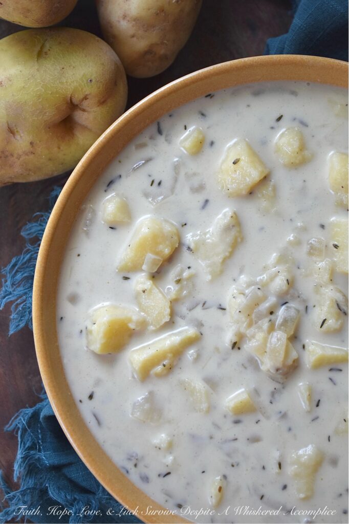 Budget-Friendly Chunky Potato Soup with Thyme - We all love the convenience of a store-bought rotisserie chicken for a quick weeknight dinner, but what if I told you that the best part of the rotisserie chicken is the part that you’ve been throwing away? The next time you buy a rotisserie chicken, instead of tossing out the leftover bones, place them in a large pot, cover them with cold water, and allow them to simmer for about an hour on your stovetop. You'll end up with a homemade broth that's richer and more flavorful than anything you can pour from a carton. And, by using this simple, homemade chicken broth to make this chunky potato soup with thyme, you'll see that you don't need to spend a lot to make amazing food with just a few basic ingredients.