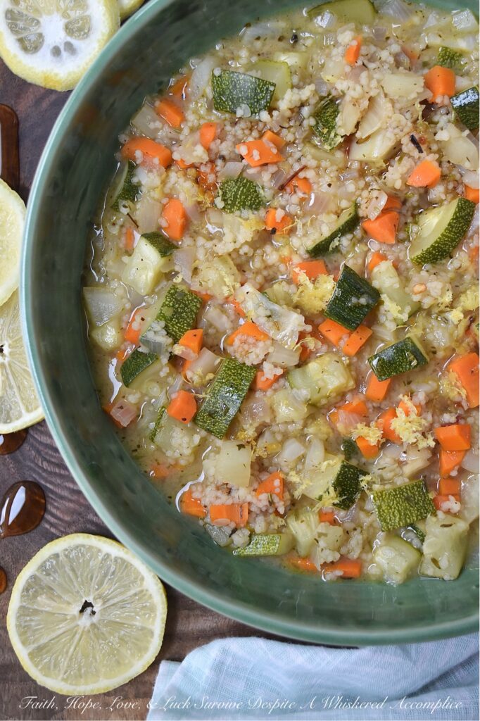 Sweet Tea Vodka Vegetable Couscous Soup - Whether you're battling a lingering cold, shaking off a chilly day, or simply craving a hug from the inside out, that only a warm bowl of soup can deliver, this colorful, fresh vegetable and pasta soup is your answer. This vibrant, one-pot wonder packed with fennel, carrots, red onion, zucchini, and Moroccan couscous is as nourishing as it is delicious. But what truly sets this soup apart is the addition of sweet tea vodka for a subtle, warming sweetness, along with a final garnish of vibrant, fresh lemon zest and a glorious drizzle of sweet and spicy hot honey. This is the kind of soup that wraps you in warmth, nourishes your soul, and genuinely makes you feel better from the inside out. Best of all, it's incredibly versatile; feel free to swap in your favorite vegetables based on what you have on hand.