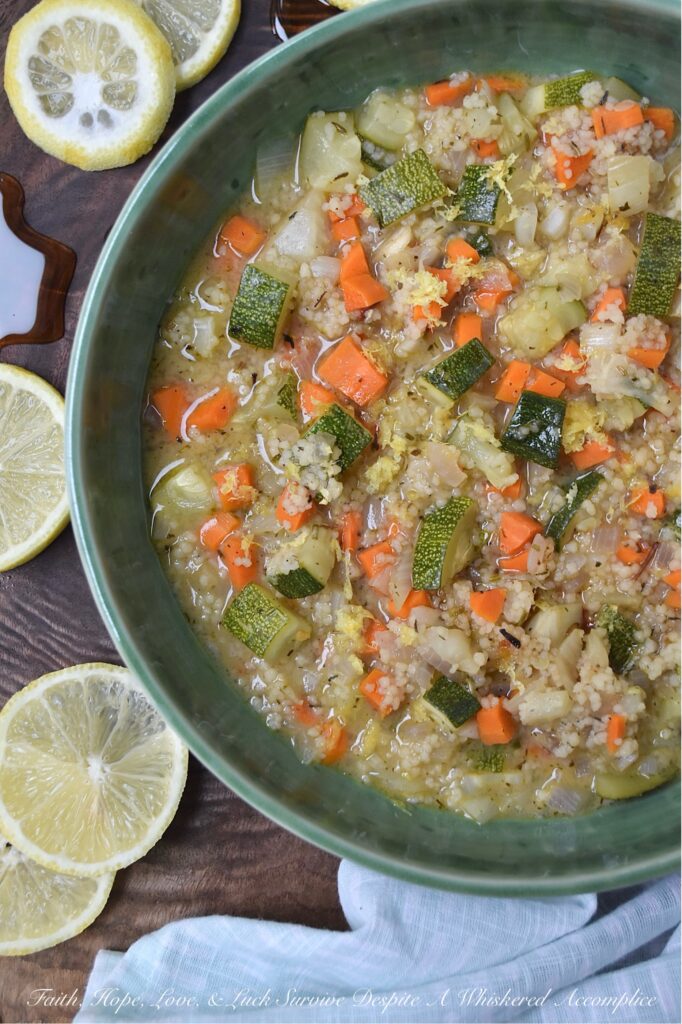 Sweet Tea Vodka Vegetable Couscous Soup - Whether you're battling a lingering cold, shaking off a chilly day, or simply craving a hug from the inside out, that only a warm bowl of soup can deliver, this colorful, fresh vegetable and pasta soup is your answer. This vibrant, one-pot wonder packed with fennel, carrots, red onion, zucchini, and Moroccan couscous is as nourishing as it is delicious. But what truly sets this soup apart is the addition of sweet tea vodka for a subtle, warming sweetness, along with a final garnish of vibrant, fresh lemon zest and a glorious drizzle of sweet and spicy hot honey. This is the kind of soup that wraps you in warmth, nourishes your soul, and genuinely makes you feel better from the inside out. Best of all, it's incredibly versatile; feel free to swap in your favorite vegetables based on what you have on hand.