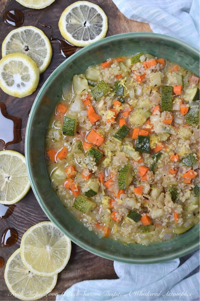 Sweet Tea Vodka Vegetable Couscous Soup - Whether you're battling a lingering cold, shaking off a chilly day, or simply craving a hug from the inside out, that only a warm bowl of soup can deliver, this colorful, fresh vegetable and pasta soup is your answer. This vibrant, one-pot wonder packed with fennel, carrots, red onion, zucchini, and Moroccan couscous is as nourishing as it is delicious. But what truly sets this soup apart is the addition of sweet tea vodka for a subtle, warming sweetness, along with a final garnish of vibrant, fresh lemon zest and a glorious drizzle of sweet and spicy hot honey. This is the kind of soup that wraps you in warmth, nourishes your soul, and genuinely makes you feel better from the inside out. Best of all, it's incredibly versatile; feel free to swap in your favorite vegetables based on what you have on hand.