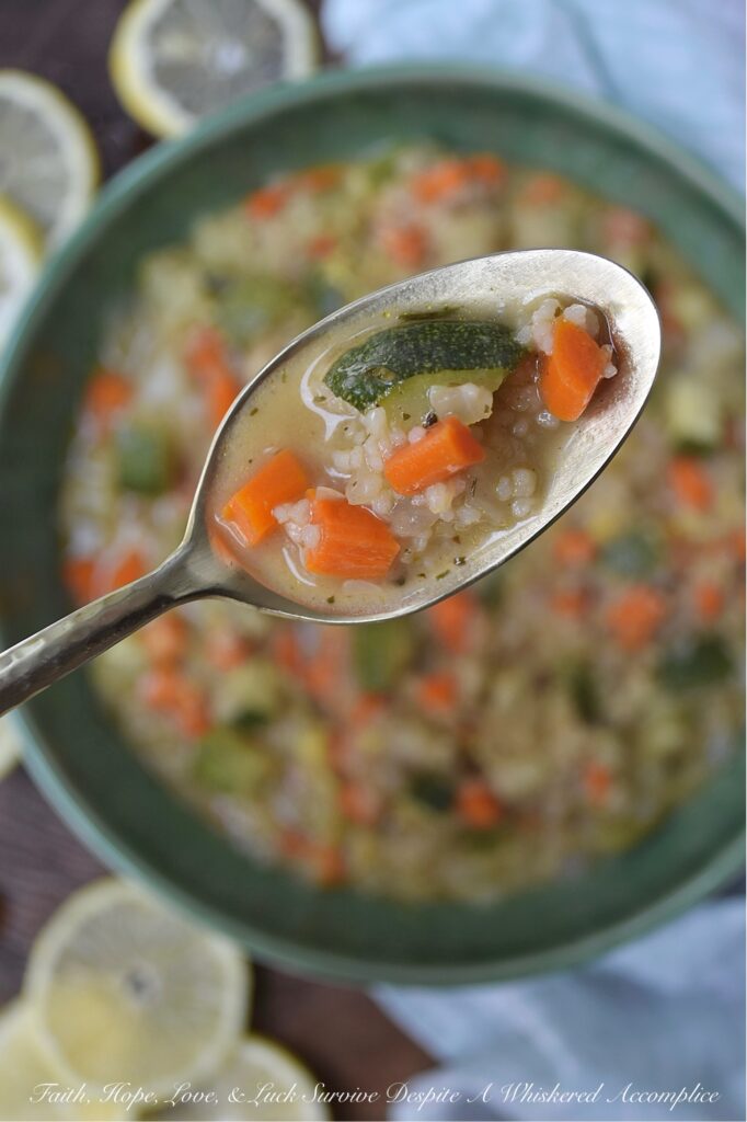 Sweet Tea Vodka Vegetable Couscous Soup - Whether you're battling a lingering cold, shaking off a chilly day, or simply craving a hug from the inside out, that only a warm bowl of soup can deliver, this colorful, fresh vegetable and pasta soup is your answer. This vibrant, one-pot wonder packed with fennel, carrots, red onion, zucchini, and Moroccan couscous is as nourishing as it is delicious. But what truly sets this soup apart is the addition of sweet tea vodka for a subtle, warming sweetness, along with a final garnish of vibrant, fresh lemon zest and a glorious drizzle of sweet and spicy hot honey. This is the kind of soup that wraps you in warmth, nourishes your soul, and genuinely makes you feel better from the inside out. Best of all, it's incredibly versatile; feel free to swap in your favorite vegetables based on what you have on hand.