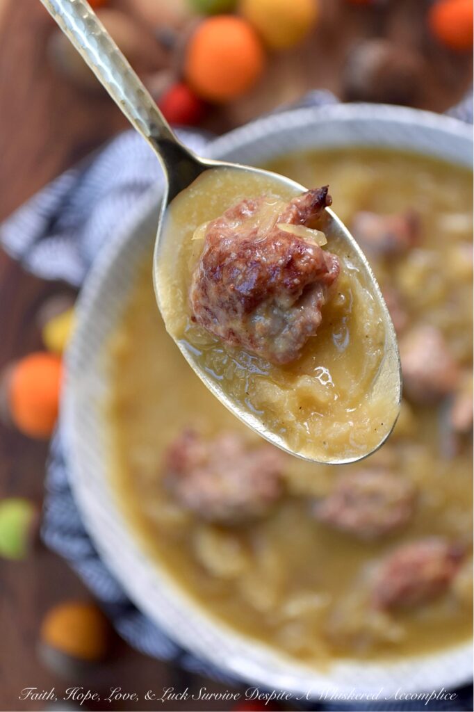 Roasted Acorn Squash Oktoberfest Soup - Imagine halved acorn squash, tangy sauerkraut, and savory beer brats, all mingling together in a single baking dish with a generous splash of flavorful Oktoberfest beer and a whisper of brown sugar. Everything roasts to perfection, building layers of irresistible flavor. The oven works its magic, caramelizing, tenderizing, and deepening every single flavor. Then, the roasted squash is whisked into a velvety blend with chicken broth and a kick of hot mustard, before being poured right back into the baking dish with its roasted companions. Baked until thick and bubbly, this isn't just a meal, it's a hearty, warm, German-inspired hug in a bowl.
