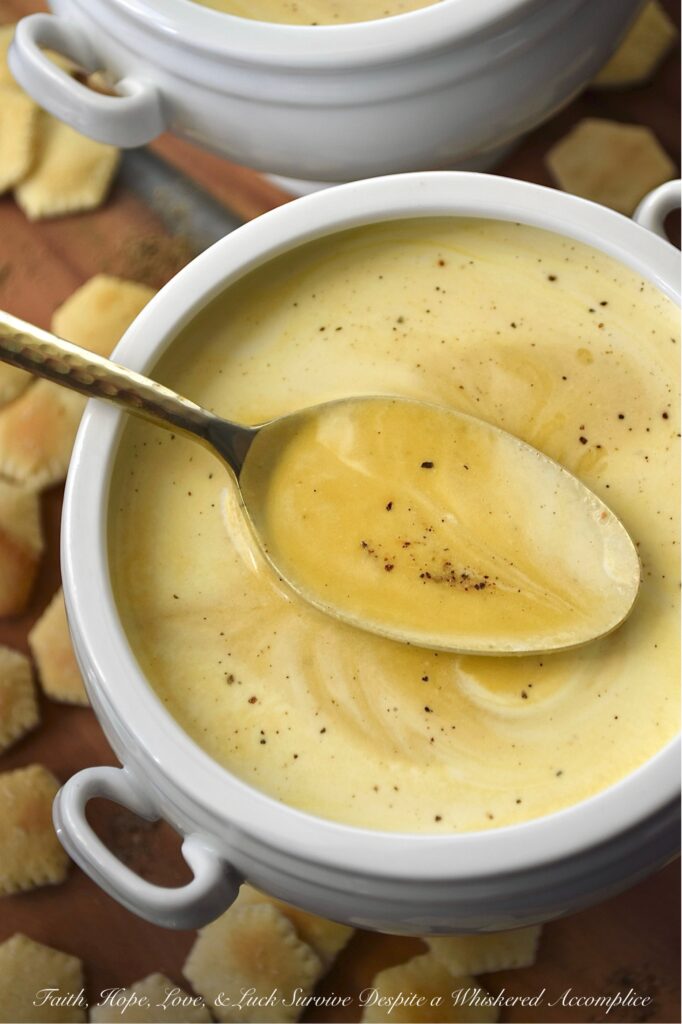 Creamy Butternut Squash Soup with Whiskey - You really don’t need a mile-long list of ingredients to take a classic bowl of creamy puréed butternut squash soup from ho-hum to absolutely swoon-worthy. The secret to unlocking a five-star-worthy butternut squash soup lies in a generous splash of whiskey and a rich swirl of heavy cream. The whiskey lends a subtle, smoky sweetness that makes you wonder why you ever made it any other way, and the cream? Well, it turns the whole thing into a decadent bowl of pure, velvety comfort. After one spoonful, you’ll never look at butternut squash soup the same way again.
