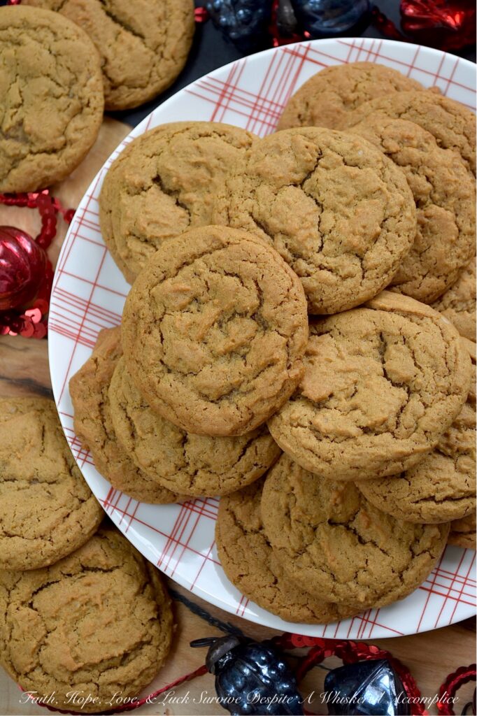 Soft & Chewy Molasses Spice Cookies - If you could only bake one cookie this holiday season, this should be it. Seriously. Forget the fussy, decorated sugar cookies and the crumbly shortbread for a moment. These Soft & Chewy Molasses Spice Cookies are a stand-alone star, boasting a deeply comforting flavor profile of ginger, cinnamon, cloves, nutmeg, and rich molasses. More importantly, this has the potential of being the most adaptable recipe in your cookie arsenal. Think of it as the little black dress of your recipe box. Perfect on its own, but ready to be accessorized with anything from white chocolate, dried fruit, or candied ginger to festive holiday-colored chocolate candies or a sweet powdered sugar icing drizzle. This perfect molasses spice cookie recipe is the ultimate blank canvas, ready to be transformed into whatever your lil' holiday heart desires.