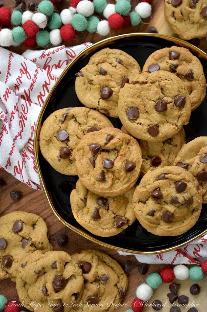 Chocolate Chip Molasses Spice Cookies - What happens when the coziest cookie of the season meets a timeless classic? You get pure, unadulterated magic. Imagine all the warm, chewy, spiced goodness you crave in a molasses spice cookie, but with a generous handful of semi-sweet chocolate chips tossed in for good measure. Think of these Chocolate Chip Molasses Cookies as the more sophisticated, mysterious cousin to the everyday traditional chocolate chip cookie. They're the perfect blend of cozy spice and rich chocolate. A grown-up, more sophisticated chocolate chip cookie that will win you over at first bite.