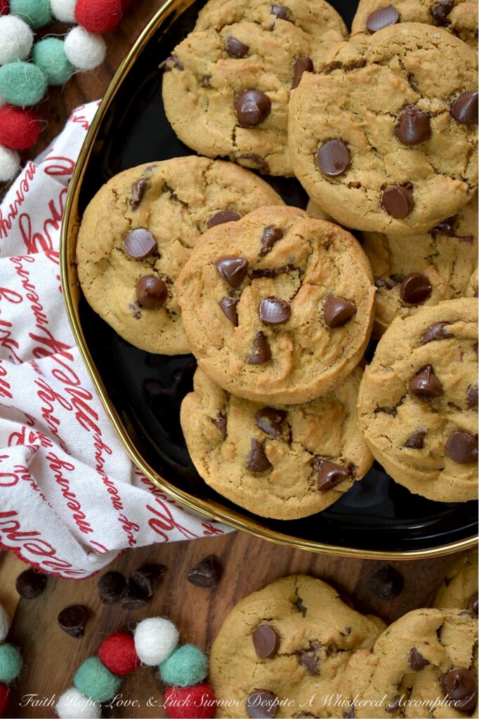 Chocolate Chip Molasses Spice Cookies - What happens when the coziest cookie of the season meets a timeless classic? You get pure, unadulterated magic. Imagine all the warm, chewy, spiced goodness you crave in a molasses spice cookie, but with a generous handful of semi-sweet chocolate chips tossed in for good measure. Think of these Chocolate Chip Molasses Cookies as the more sophisticated, mysterious cousin to the everyday traditional chocolate chip cookie. They're the perfect blend of cozy spice and rich chocolate. A grown-up, more sophisticated chocolate chip cookie that will win you over at first bite.