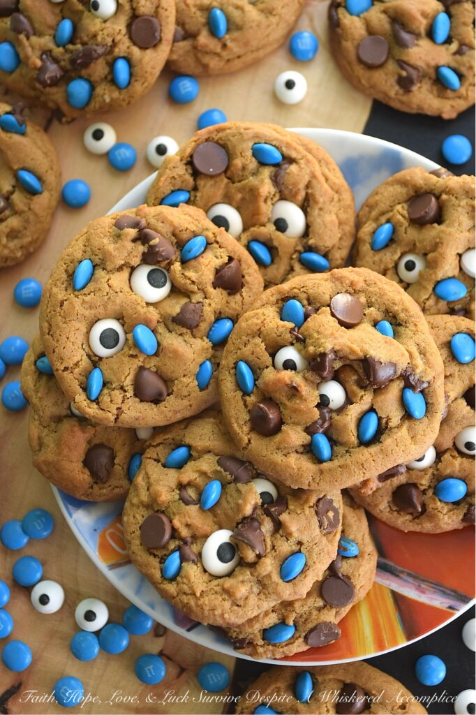 Cookie Monster Molasses Spice Cookies - What’s blue, adorable, and disappears from the cookie jar in seconds? These Cookie Monster Molasses Spice Cookies. Loaded with gooey semi-sweet chocolate chips and brought to life with a pair of silly edible candy eyeballs and blue M&M's Minis, these soft, chewy, super-chocolatey molasses spice chocolate chip cookies are ridiculously fun to decorate and even more fun to eat. They're part delicious, part adorable, and 100% guaranteed to be devoured by your own little monsters.