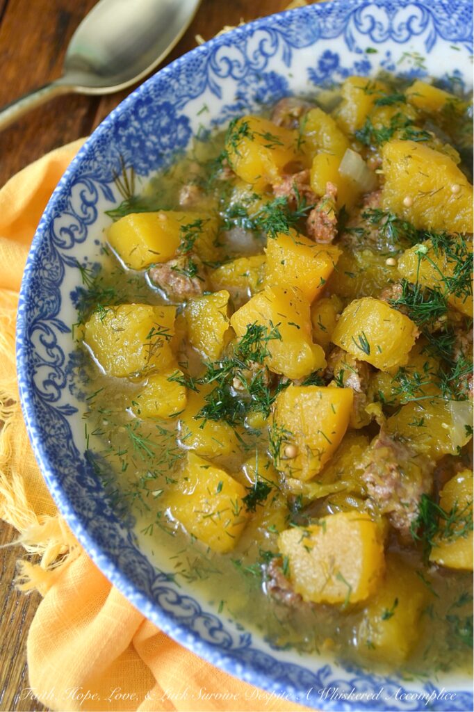 Crockpot Sausage & Dill Butternut Squash Soup - Imagine coming home to the incredible aroma of earthy butternut squash, savory sausage, and fresh dill mingling in your slow cooker. This crockpot recipe combines the tenderness of butternut squash with the salty richness of a whole pound of your favorite browned sausage. This slow-cooked soup also features a generous amount of fresh dill and the surprising addition of dill pickle juice, which helps cut through the richness of the sausage and helps to make every single bite pop. It's bold, it's easy, and you can dress this soup up with shredded Cheddar, grated Parmesan, or a little bit of heavy cream for even more flavor.